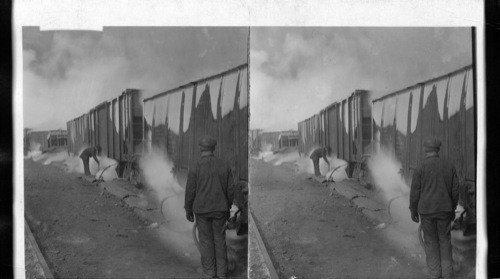 Steaming the cars of iron ore arriving in winter to prevent freezing. Homestead, Penna