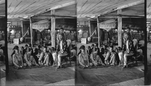 Datto Baique with his wives in the old Spanish Fort at Parang Parang, Mindanao, P.I