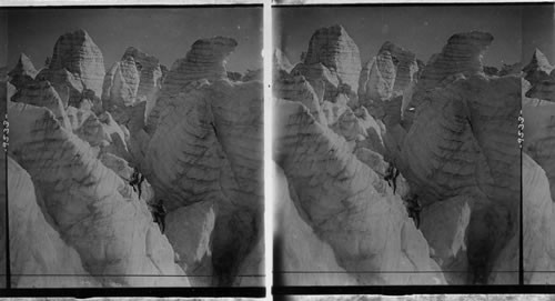 Where climbing requires steady heads - among the Seracs Great Glacier. Selkirk Mts., B.C. Canada