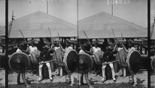 A Prince and Four of his Slaves. Philippine Concession. Jamestown Exposition. Virginia