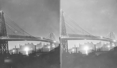 Williamsburg Bridge from the New York Side at Night. New York, N.Y