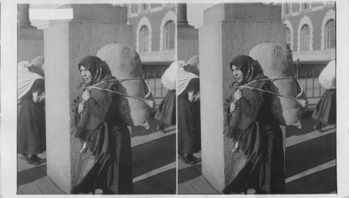 Hungarian Woman with all her Earthly belongings. Ellis Island, N.Y