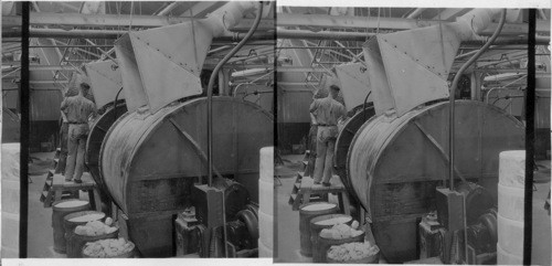 "Pebbles mills" men loading mill with mixture or "body" composed of ingredients which go to make the "slip" or clay, "Lenox Inc." Maker of fine chinaware Trenton, N.J