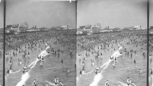 Looking East - Sunday afternoon at Coney Island. N.Y. (Shows more of the Ocean). (Replaces Dept. A - 26494)