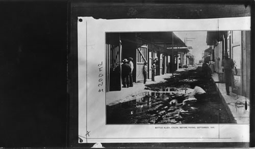 Bottle Alley Before Paving. [Text on picture: Bottle Alley, Colon, Before Paving, September, 1906]