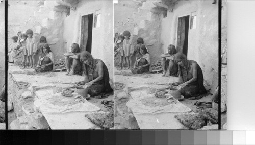 Primitive Method - A Hopi squaw coiling clay into pottery - Oraibi, Arizona