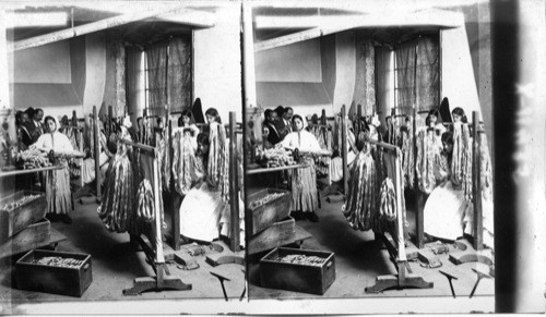 In a Syrian Silk Plant, Examining and Weighing Raw Silk, ready for Export. Syria