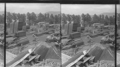 End of a lumber flume at the lumber yard on the railroad, Oregon