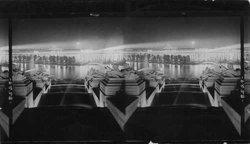 Looking down West Cascade at night and across Grand Basin at Palace of Education, Louisiana Purchase Exposition