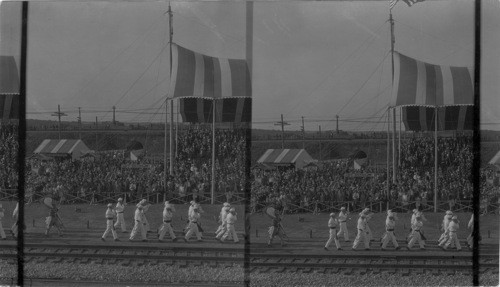 Part of Grand Stand, also R.R. Crossing Tunnel of B. & O. R.R. - Glee club Marching - Fair of the Iron Horse