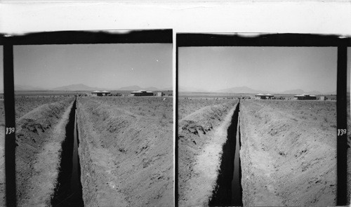 138 Near where the water of the ganat is finally needed it may sometimes come to the surface--in a narrow trench. This trench was newly dug to bring water to the Point Four Lifestock Station