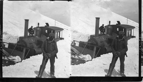 Locomotive on Pike's Peak Railway in the snow at 12,000 ft. elevation. OK is Ok not obsolete, clothes, snow