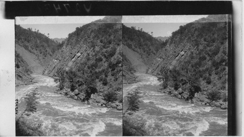 The Jhelum River has Clift the Himelayas on its way to the Plains, India