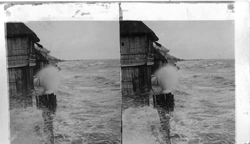 On the Luneta Beach during a typhoon - looking south - Manila. P.I