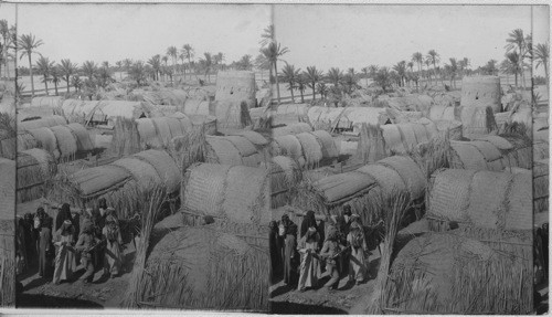 Arab village of reed mats and round fort lower Euphrates Mesopotamia