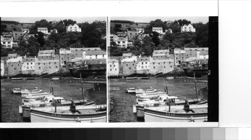 Polperro: Fisherman's cove and the old houses on the hillside of the harbor. Polperro is on the extreme southwest coast of Britain