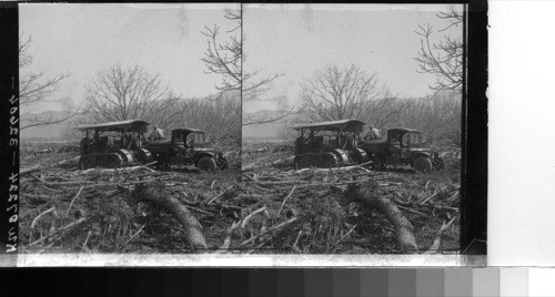 Tractor working in the debris, Santa Paula, Calif