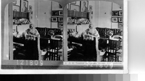 [Translated from front "Leo Tolstoy at work in his office." Yasnaya Polyana, near Moscow, Rossia, 1910.]