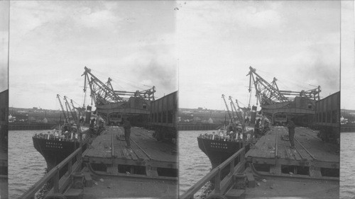 Boat loaded with iron ore from Newfoundland bend, unloaded at steel works, Sydney, CBI, Canada