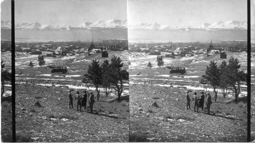 A little west of south - looking over Leadville, Colorado to Mt Massive (at right) 14424 ft. over tree top, & Mt. Elbert (at left).14421 ft. Lake County, Colo