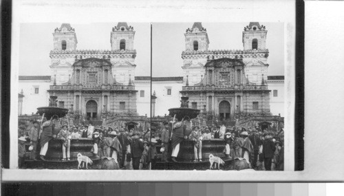 The usual crowd about the fountain in the market square before Church of S. Francis. Quito, Ecuador