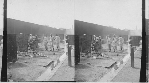 Preparing a body for burning - Hindu burning place - Bombay. India