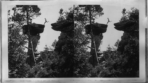 Making a perilous leap to Stand Rock. Wisconsin