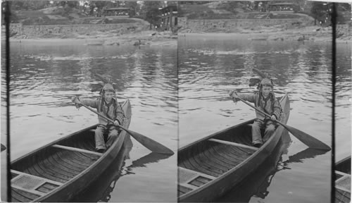 An "Indian" canoeing, New York State