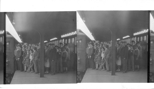 N.Y. City school Children taking train of the Interborough Rapid Transit at the subway station at Pilham Bay Parkway after a days outing