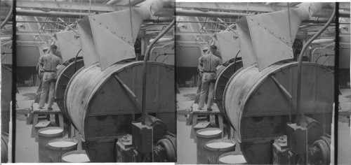 "Pebble mills" men loading mill with mixture or "body" composed of ingredients which go to make the "slip" or "clay", "Lenox Inc." makers of fine chinaware, Trenton, N.J