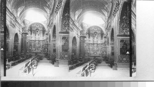 One of the massive aisles in La Compania Church - wall decorating of gold, Quito, Ecuador