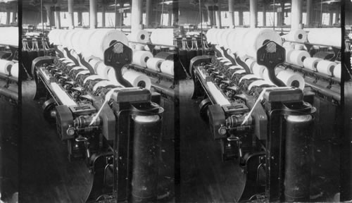 "Combing" - A modern machine which eliminated the shorter cotton from the longer. Standard Coosa Thatcher Co. Chattanooga, Tenn