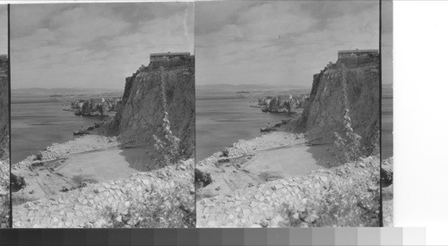 Gibraltar bay from near the point of the peninsula. Officers quarters surmounting the cliff. Gibraltar. Spain