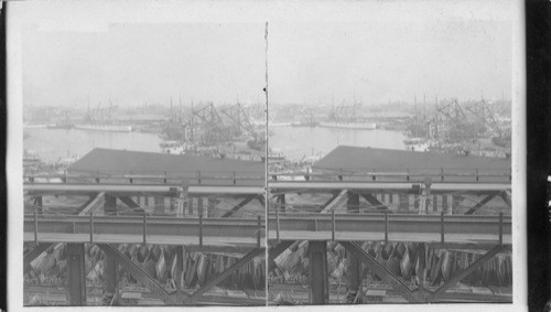 Looking E. over Basin of B'lyn Navy Yards showing warships being overhauled for the long trip to the Pacific. Photographed Nov. 4, 1907. N.Y