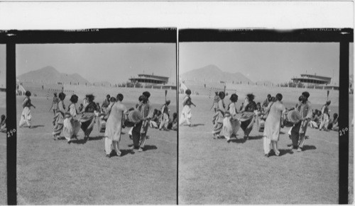 290 See 287 and 289 Patham tribesmen (at the occasion of the Jeshen national holiday) performing their dances in the Kabul stadium. P.427 Sept 53. Dec 1933 Geogr. P. 757