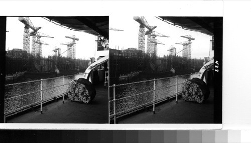 Great Britain, Scotland Near Glasgow: The busy shipyards of the Harland Wolff Shipbuilding Company on the Clyde River just below the busy downtown section of the city