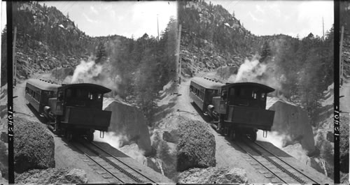 Train Descending Pike's Peak On The Famous Cog Railway, Colorado