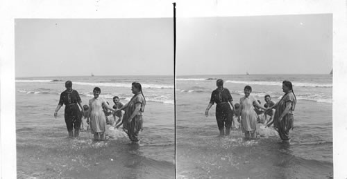 Wading in Sound, Coney Island, New York