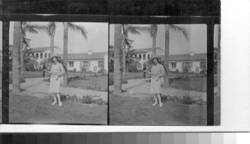 Mrs. Agnes Lanier in the patio of hotel. Agua Calientes. California. (?)