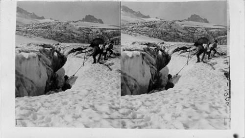 Receiving a victim of a snow slide from crevasse in the Great Cowlitz-Glacier, Mt. Rainier National Park, Wash