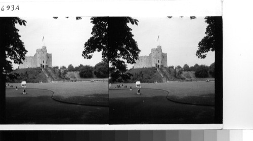 Great Britain Wales Cardiff: Cardiff castle is built about a hollow square in the center of which stands the old Norman stone fort - a polygonal "keep" which was built sometime in the 13th Century to replace a wooden structure built by earlier Normans and destroyed by an attacking Welsh ruler. the Norman forts were built upon ruins of an old Roman fort built here around 74 A.D., which ruins form the foundation of the hill the present fort crowns. Since the middle of 1948 the castle has been the property of Cardiff City Council, and is to be used for local public purposes and for the benefit of the citizens of Cardiff. Its broad lawns surrounding the old "keep" are a great place for basking in the sun