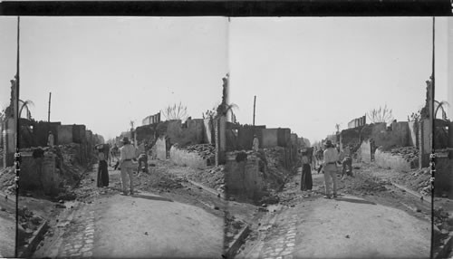 The first steps toward reconstructing the devastated city, carrying away the debris. Kingston, Jamaica