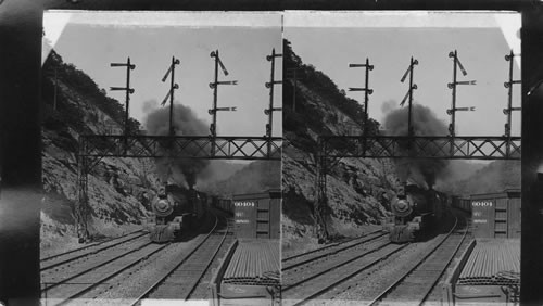 Passenger train passing under the signal trestle. D L. and W. R. R. New Jersey