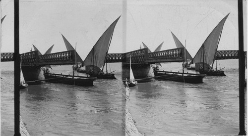 Sail boats going through the bridge, Cairo, Egypt