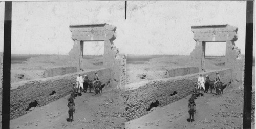 Tourists at the entrance to the Temple of the Hathor, Dendera. Egypt