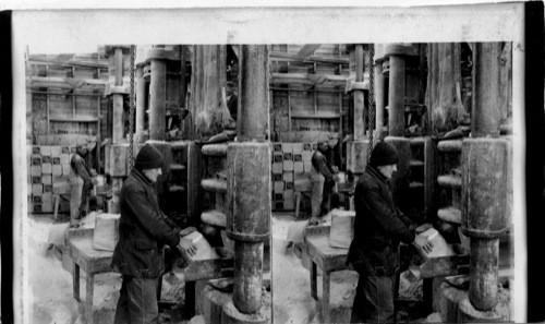 Making salt blocks with compressed air press. Hutchinson, Kansas