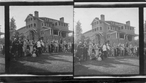 Pres. and Mrs. Coolidge eating ice cream on lawn of the Summer White House to the President's right is his military aide. South Dakota