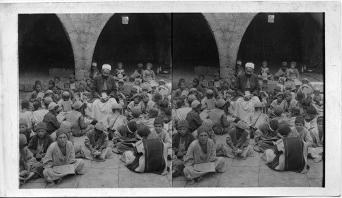 Teaching the Koran in Mohammedan School at Beeroth, Palestine