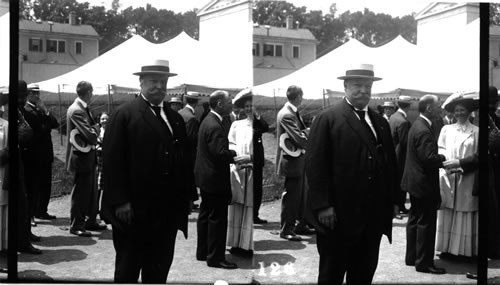 Secy Taft posing for picture before entering dining hall. New Haven, Conn