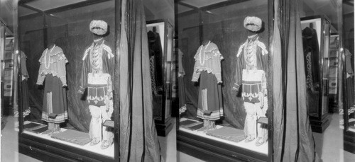 Man's costume and woman's dress. Field Museum, Chicago, Ill